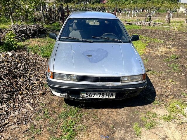 Сірий Міцубісі Lancer, об'ємом двигуна 1.5 л та пробігом 510 тис. км за 900 $, фото 1 на Automoto.ua