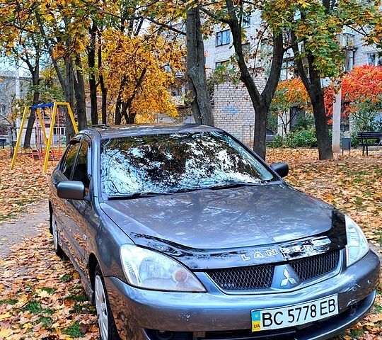 Сірий Міцубісі Lancer, об'ємом двигуна 1.6 л та пробігом 206 тис. км за 3300 $, фото 1 на Automoto.ua