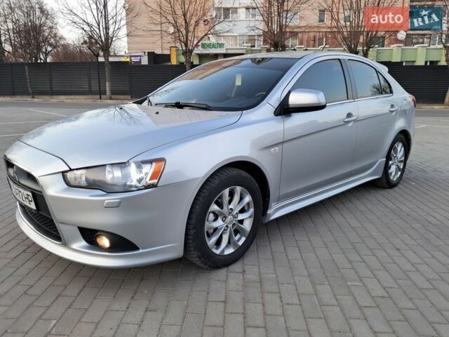 Серый Мицубиси Лансер, объемом двигателя 1.8 л и пробегом 158 тыс. км за 7350 $, фото 1 на Automoto.ua