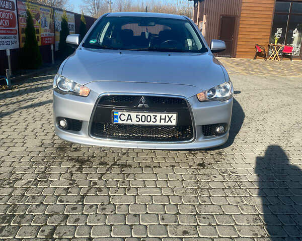 Сірий Міцубісі Lancer, об'ємом двигуна 1.8 л та пробігом 113 тис. км за 7900 $, фото 1 на Automoto.ua