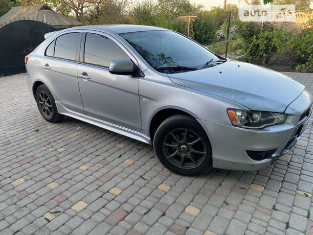 Сірий Міцубісі Lancer, об'ємом двигуна 1.8 л та пробігом 209 тис. км за 6500 $, фото 1 на Automoto.ua