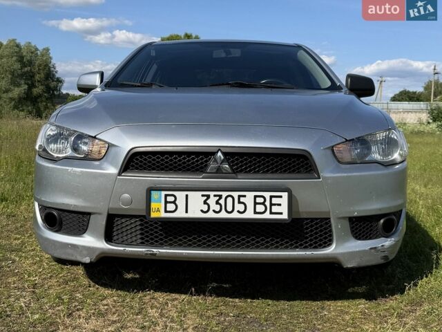 Сірий Міцубісі Lancer, об'ємом двигуна 1.8 л та пробігом 234 тис. км за 6200 $, фото 1 на Automoto.ua