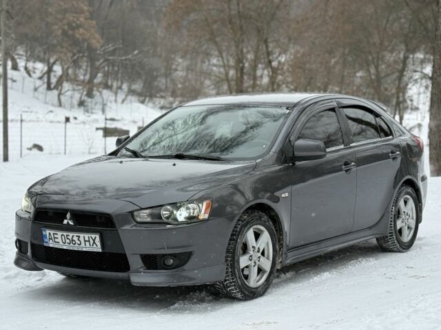 Серый Мицубиси Лансер, объемом двигателя 1.8 л и пробегом 240 тыс. км за 6000 $, фото 1 на Automoto.ua