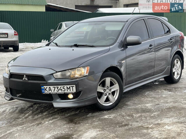 Серый Мицубиси Лансер, объемом двигателя 1.8 л и пробегом 248 тыс. км за 6800 $, фото 1 на Automoto.ua