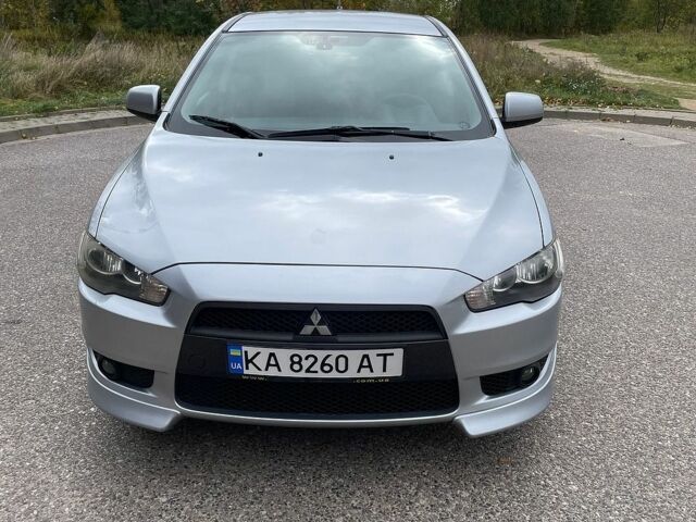 Сірий Міцубісі Lancer, об'ємом двигуна 1.8 л та пробігом 128 тис. км за 7500 $, фото 1 на Automoto.ua