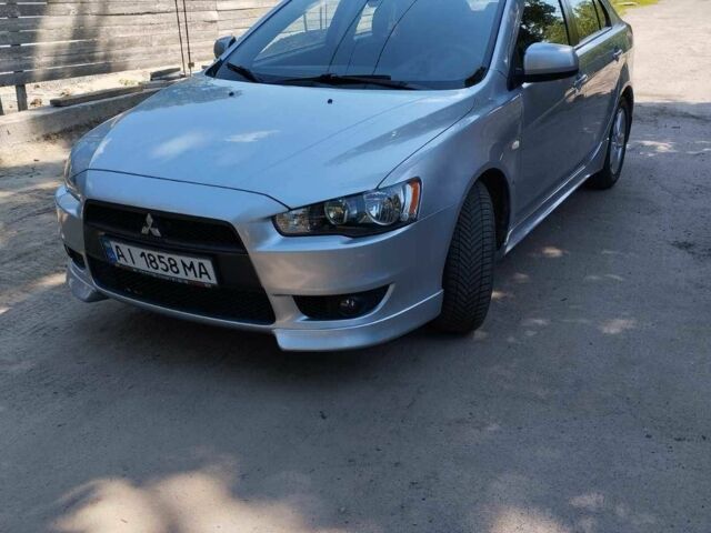 Сірий Міцубісі Lancer, об'ємом двигуна 1.8 л та пробігом 133 тис. км за 6550 $, фото 1 на Automoto.ua