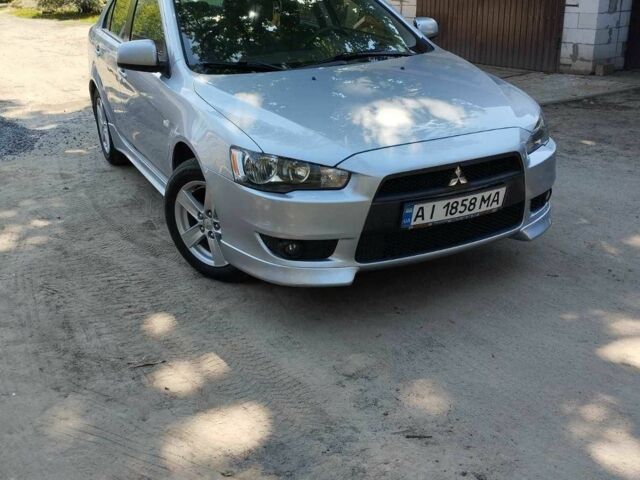 Сірий Міцубісі Lancer, об'ємом двигуна 1.8 л та пробігом 133 тис. км за 6550 $, фото 1 на Automoto.ua