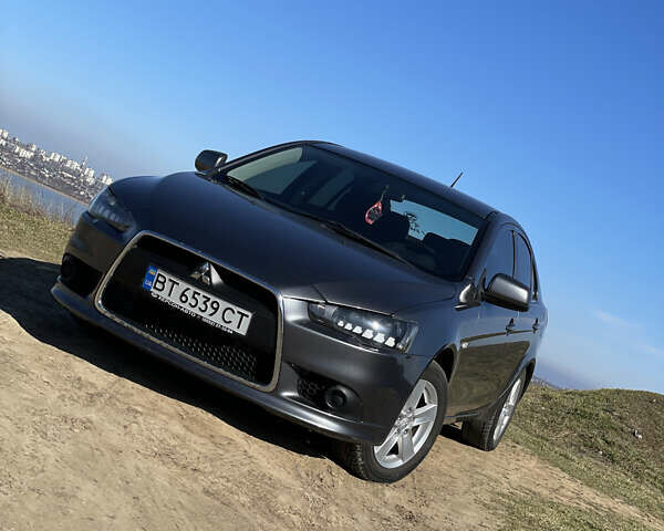 Серый Мицубиси Лансер, объемом двигателя 1.5 л и пробегом 139 тыс. км за 6600 $, фото 1 на Automoto.ua