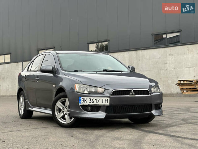 Серый Мицубиси Лансер, объемом двигателя 2.4 л и пробегом 220 тыс. км за 6499 $, фото 1 на Automoto.ua