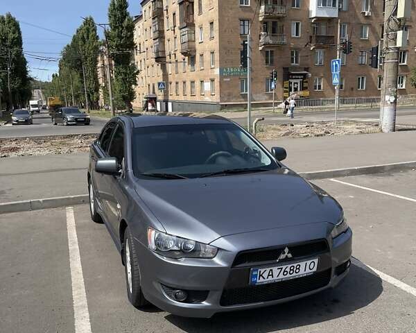 Серый Мицубиси Лансер, объемом двигателя 1.8 л и пробегом 277 тыс. км за 6000 $, фото 1 на Automoto.ua