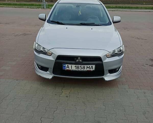 Сірий Міцубісі Lancer, об'ємом двигуна 1.8 л та пробігом 133 тис. км за 6900 $, фото 1 на Automoto.ua