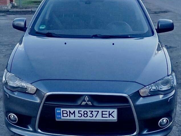 Серый Мицубиси Лансер, объемом двигателя 1.59 л и пробегом 226 тыс. км за 6350 $, фото 1 на Automoto.ua