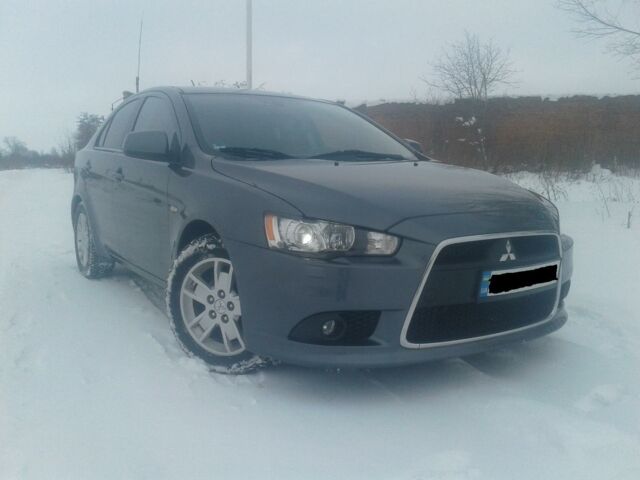 Сірий Міцубісі Lancer, об'ємом двигуна 1.6 л та пробігом 106 тис. км за 9000 $, фото 1 на Automoto.ua