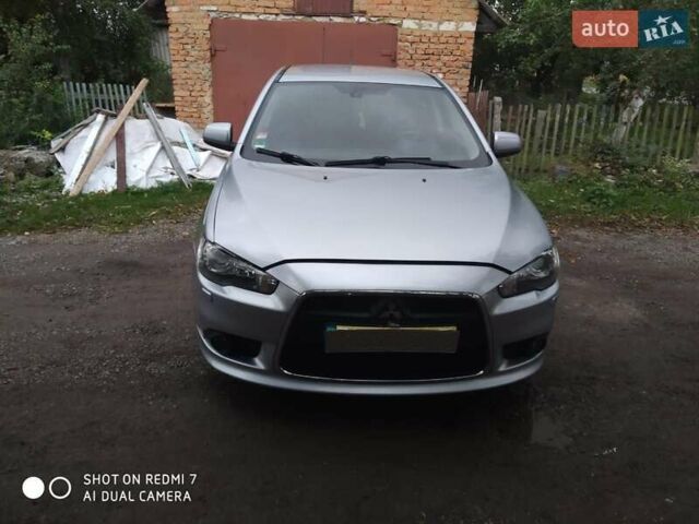 Сірий Міцубісі Lancer, об'ємом двигуна 1.8 л та пробігом 216 тис. км за 7200 $, фото 1 на Automoto.ua