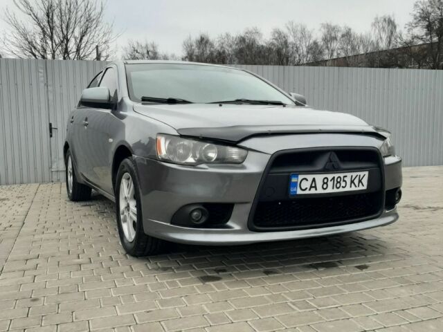 Серый Мицубиси Лансер, объемом двигателя 1.6 л и пробегом 180 тыс. км за 6300 $, фото 1 на Automoto.ua