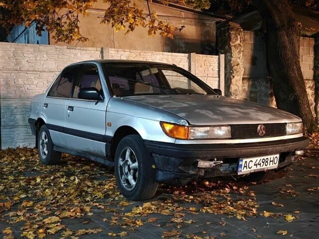 Сірий Міцубісі Lancer, об'ємом двигуна 1.5 л та пробігом 100 тис. км за 1200 $, фото 1 на Automoto.ua