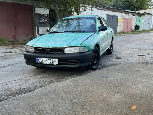 Сірий Міцубісі Lancer, об'ємом двигуна 1.3 л та пробігом 3 тис. км за 700 $, фото 1 на Automoto.ua