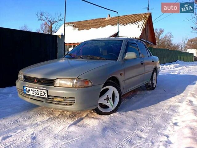 Серый Мицубиси Лансер, объемом двигателя 1.59 л и пробегом 450 тыс. км за 1400 $, фото 1 на Automoto.ua