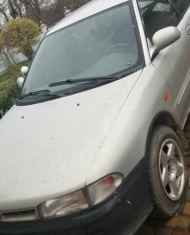 Сірий Міцубісі Lancer, об'ємом двигуна 1.3 л та пробігом 377 тис. км за 1000 $, фото 1 на Automoto.ua