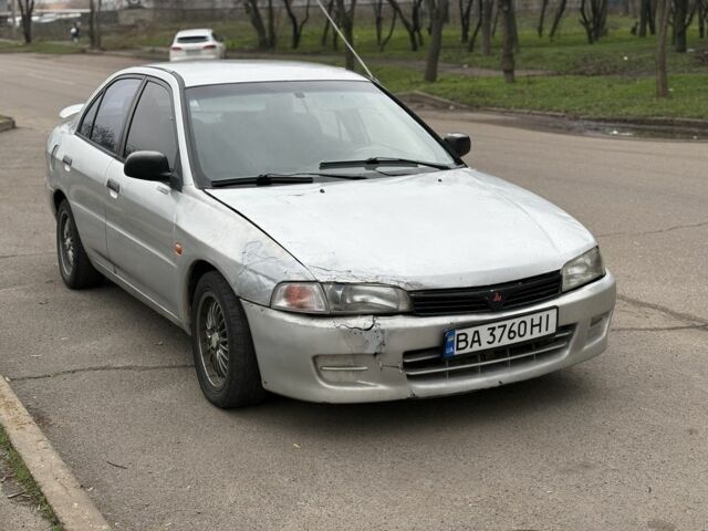 Сірий Міцубісі Lancer, об'ємом двигуна 1.3 л та пробігом 200 тис. км за 1100 $, фото 1 на Automoto.ua