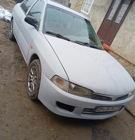 Серый Мицубиси Лансер, объемом двигателя 1.3 л и пробегом 260 тыс. км за 1700 $, фото 1 на Automoto.ua