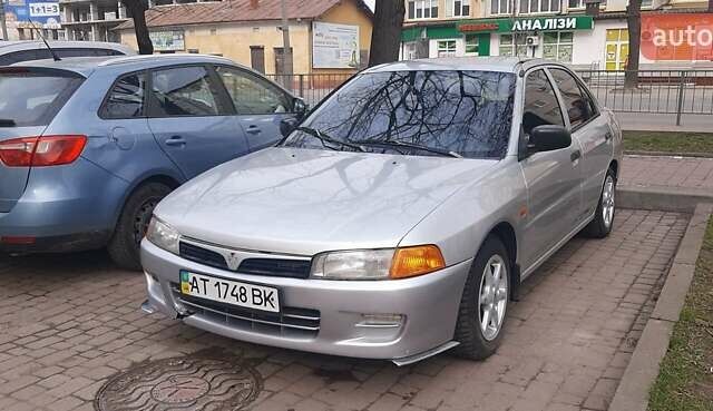 Сірий Міцубісі Lancer, об'ємом двигуна 1.3 л та пробігом 430 тис. км за 2000 $, фото 1 на Automoto.ua