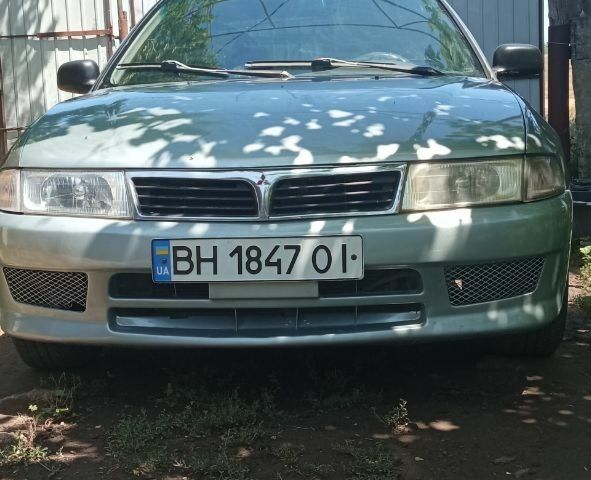 Сірий Міцубісі Lancer, об'ємом двигуна 1.3 л та пробігом 362 тис. км за 2300 $, фото 1 на Automoto.ua