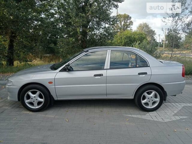 Сірий Міцубісі Lancer, об'ємом двигуна 1.3 л та пробігом 90 тис. км за 4800 $, фото 1 на Automoto.ua