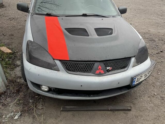 Сірий Міцубісі Lancer, об'ємом двигуна 2 л та пробігом 250 тис. км за 1500 $, фото 1 на Automoto.ua