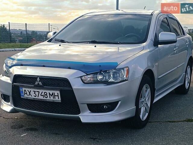 Серый Мицубиси Лансер, объемом двигателя 1.5 л и пробегом 166 тыс. км за 6999 $, фото 1 на Automoto.ua