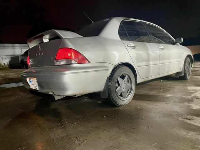 Сірий Міцубісі Lancer, об'ємом двигуна 2 л та пробігом 3 тис. км за 3850 $, фото 1 на Automoto.ua