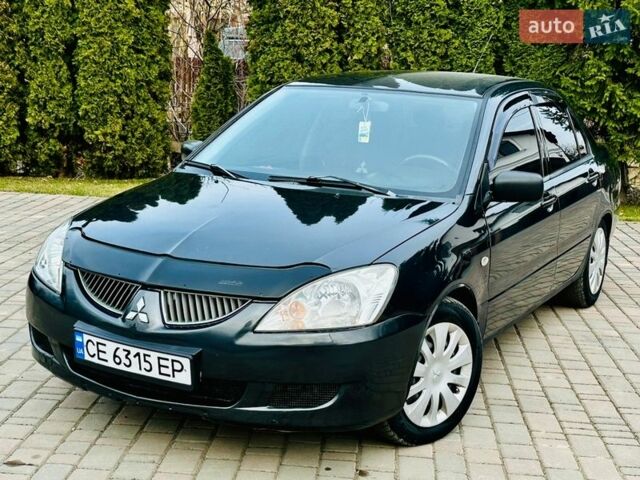 Сірий Міцубісі Lancer, об'ємом двигуна 1.6 л та пробігом 234 тис. км за 2950 $, фото 1 на Automoto.ua