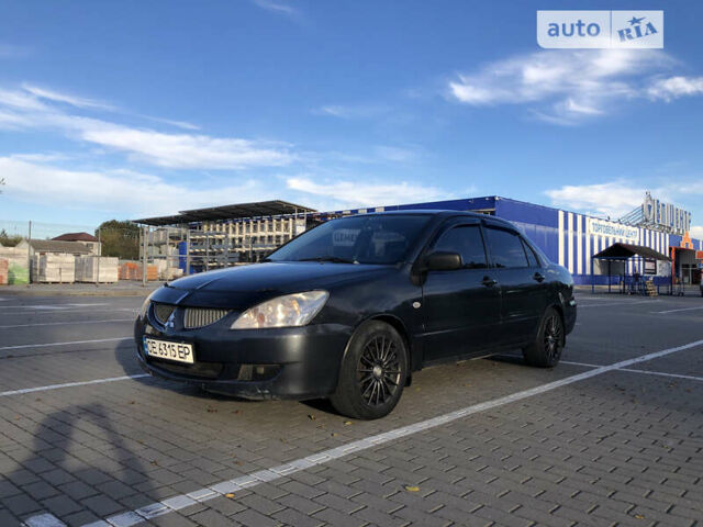 Сірий Міцубісі Lancer, об'ємом двигуна 1.58 л та пробігом 232 тис. км за 2899 $, фото 1 на Automoto.ua