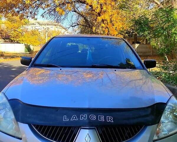 Сірий Міцубісі Lancer, об'ємом двигуна 1.6 л та пробігом 380 тис. км за 5200 $, фото 1 на Automoto.ua