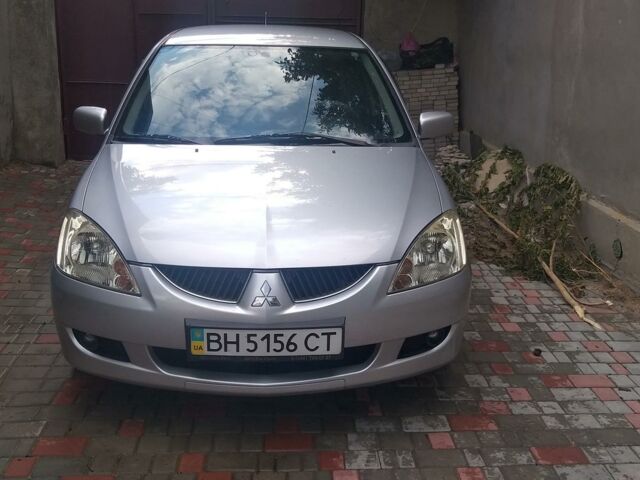 Сірий Міцубісі Lancer, об'ємом двигуна 1.6 л та пробігом 194 тис. км за 4800 $, фото 1 на Automoto.ua
