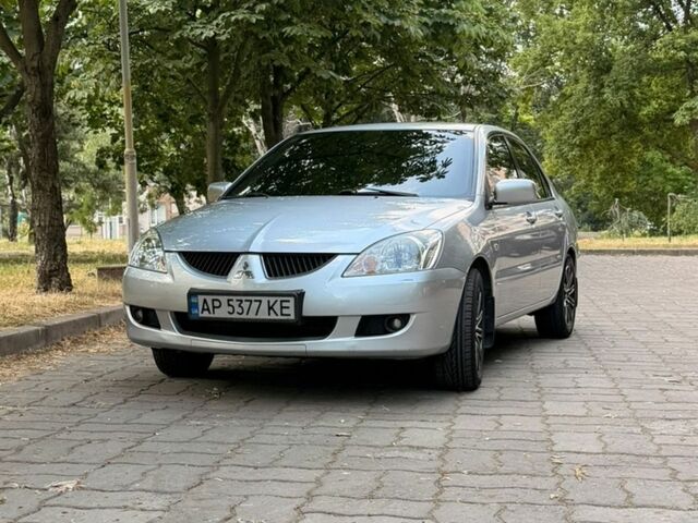 Сірий Міцубісі Lancer, об'ємом двигуна 1.6 л та пробігом 107 тис. км за 5999 $, фото 1 на Automoto.ua