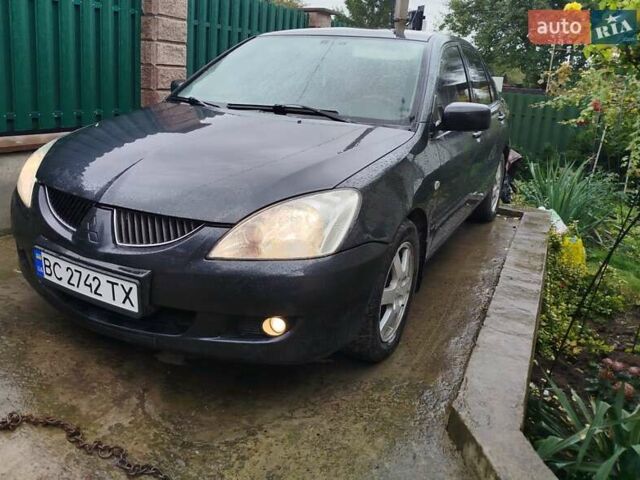 Сірий Міцубісі Lancer, об'ємом двигуна 1.6 л та пробігом 260 тис. км за 2799 $, фото 1 на Automoto.ua
