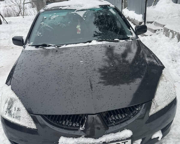 Сірий Міцубісі Lancer, об'ємом двигуна 1.6 л та пробігом 230 тис. км за 3000 $, фото 1 на Automoto.ua