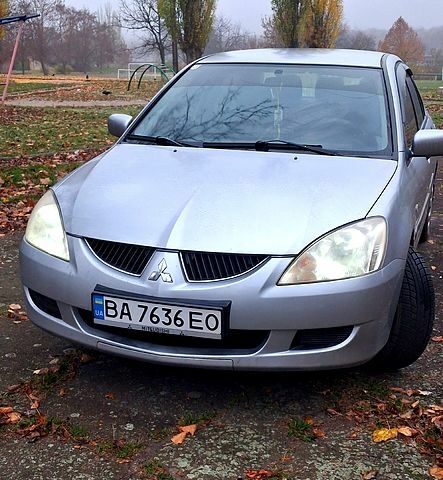 Сірий Міцубісі Lancer, об'ємом двигуна 1.6 л та пробігом 213 тис. км за 4400 $, фото 1 на Automoto.ua