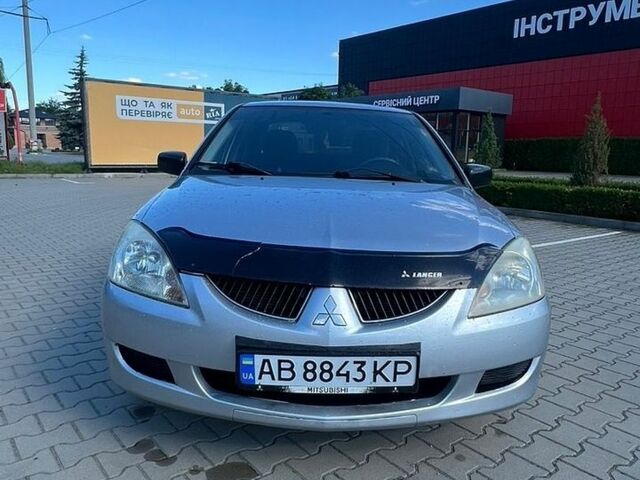 Сірий Міцубісі Lancer, об'ємом двигуна 1.58 л та пробігом 230 тис. км за 2450 $, фото 1 на Automoto.ua