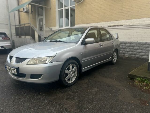 Сірий Міцубісі Lancer, об'ємом двигуна 1.6 л та пробігом 171 тис. км за 4500 $, фото 1 на Automoto.ua