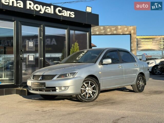 Сірий Міцубісі Lancer, об'ємом двигуна 1.58 л та пробігом 330 тис. км за 5400 $, фото 1 на Automoto.ua