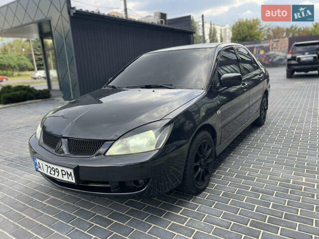 Сірий Міцубісі Lancer, об'ємом двигуна 1.6 л та пробігом 250 тис. км за 3300 $, фото 1 на Automoto.ua