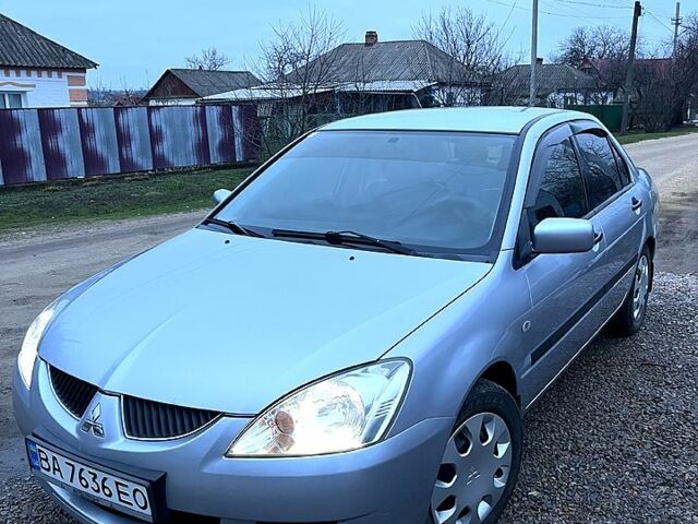 Серый Мицубиси Лансер, объемом двигателя 1.6 л и пробегом 213 тыс. км за 4300 $, фото 1 на Automoto.ua