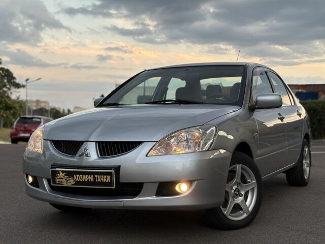 Сірий Міцубісі Lancer, об'ємом двигуна 1.6 л та пробігом 93 тис. км за 5024 $, фото 1 на Automoto.ua