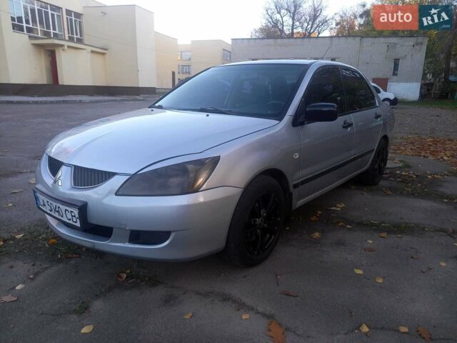 Сірий Міцубісі Lancer, об'ємом двигуна 1.6 л та пробігом 275 тис. км за 3400 $, фото 1 на Automoto.ua