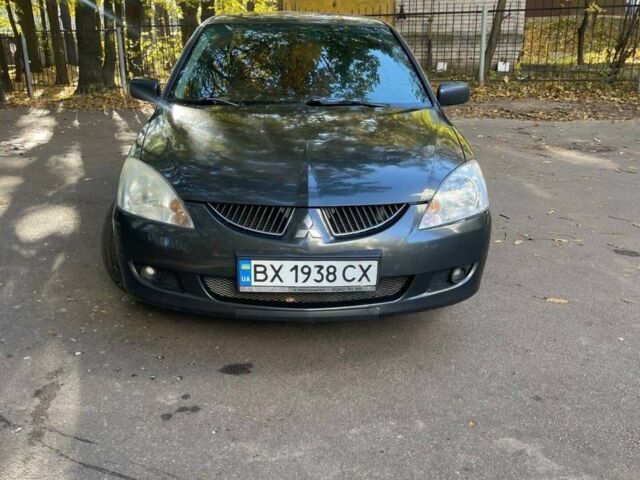 Сірий Міцубісі Lancer, об'ємом двигуна 1.6 л та пробігом 324 тис. км за 4200 $, фото 1 на Automoto.ua