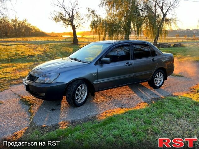 Сірий Міцубісі Lancer, об'ємом двигуна 1.6 л та пробігом 275 тис. км за 3000 $, фото 1 на Automoto.ua