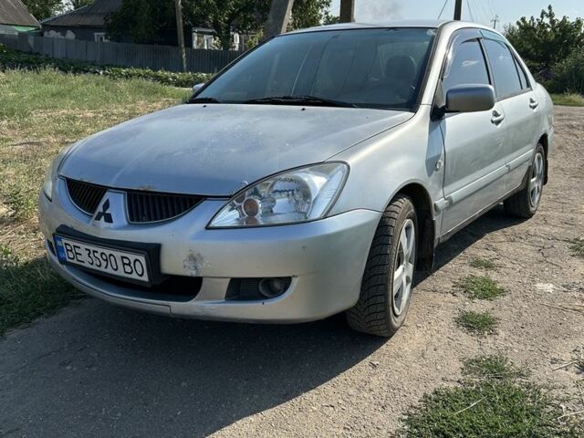 Сірий Міцубісі Lancer, об'ємом двигуна 1.6 л та пробігом 500 тис. км за 2202 $, фото 1 на Automoto.ua