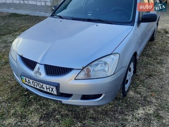 Сірий Міцубісі Lancer, об'ємом двигуна 1.58 л та пробігом 273 тис. км за 2900 $, фото 1 на Automoto.ua